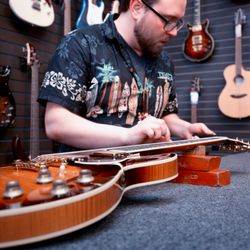 Music & Arts - We offer guitar tune ups, re-strings, and much more.