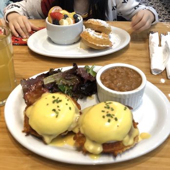 Starving Artist Waffles & Espresso - Eggs benny on potato waffles with baked beans and green salad. Starter waffle with fruits (perfect for kids) - Breakfast & Brunch Near Me - Markham, Ontario Starving Artist Waffles & Espresso - Eggs benny on potato waffles with baked beans and green salad. Starter waffle with fruits (perfect for kids) - Breakfast & Brunch Near Me - Markham, Ontario