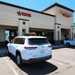 Red Star Vapor & Smoke - Exterior - Storefront with signage