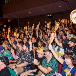 Kalwin Graphic Services - Impractical Jokers Masks for Comic Con SanDiego - Enthusiastic crowds given a choice of four faces on sticks for interactive event.