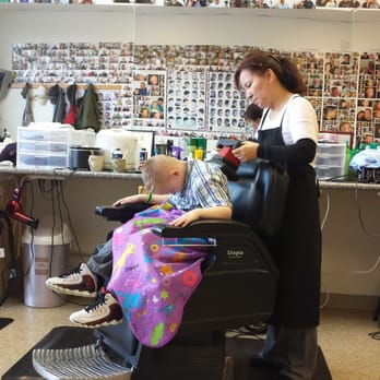 Q Barber Shop - Enjoying the massage after a haircut. - Barbers Near Me - Spanaway, Washington