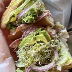 Deli Delicious - Salami, Avocado, Sprouts and Cream Cheese Sandwich on Dutch Crunch with the works! Size: Medium.