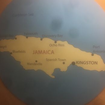 Jamaica Jerk - Minimalist decor, but who doesn't appreciate a wall placard atlas of Jamaica, right? - Caribbean Near Me - Skokie, Illinois