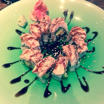 Sushi Gallery - Romantic sunset roll (bbq eel, cucumber, avocado, topped with cooked salmon) - Sushi Bars Near Me - Brooklyn, New York Sushi Gallery - Romantic sunset roll (bbq eel, cucumber, avocado, topped with cooked salmon) - Sushi Bars Near Me - Brooklyn, New York