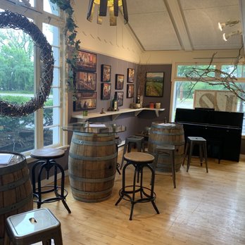 Petter Wine Gallery - wine barrels and a piano - Wine Bars Near Me - Douglas, Michigan
