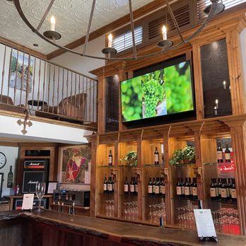 Sol De Paso - a bar with a large screen tv - Wine Tasting Room Near Me - Paso Robles, California