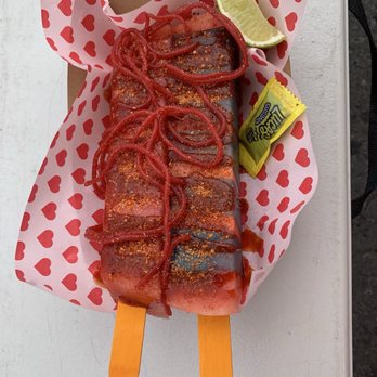 La Michis - Watermelon on a stick wrapped w/fruit roll up. Refreshing! - Desserts Near Me - Kailua-Kona, Hawaii La Michis - Watermelon on a stick wrapped w/fruit roll up. Refreshing! - Desserts Near Me - Kailua-Kona, Hawaii