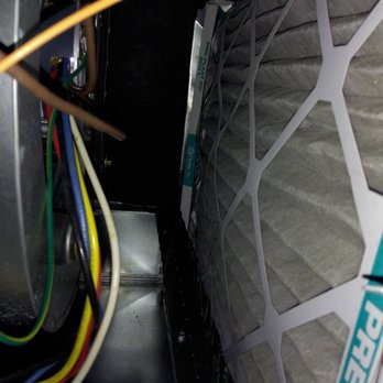 Adam Home Services - Inside view reveals old filter - Heating & Air Conditioning/HVAC Near Me - Havertown, Pennsylvania