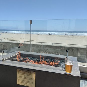 The Deck - Right next to the beach.  I turned on the fire pit. - Lounges Near Me - Pismo Beach, California