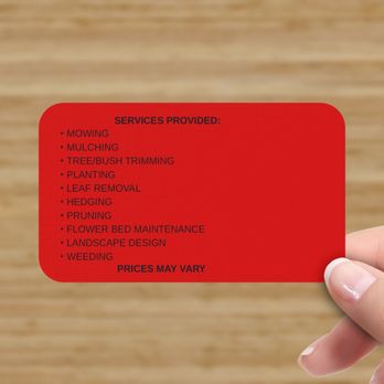 Caribbean Lawnscape - a hand holding a business card - Landscaping Near Me Caribbean Lawnscape - a hand holding a business card - Landscaping Near Me