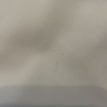 Todd Layne Cleaners - White pants: damaged fabric - Sewing & Alterations Near Me - New York, New York