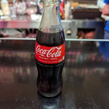 The Roast Grill Hot Weiners - a bottle of coke - Hot Dogs Near Me - Raleigh, North Carolina The Roast Grill Hot Weiners - a bottle of coke - Hot Dogs Near Me - Raleigh, North Carolina