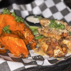 Tucker's On Grand - Award-winning wings--the best in Chicago and the suburbs!!!! Try lemon pepper, garlic Parmesan, Buffalo, or barbecue.
