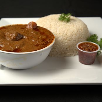 Thunka Kitchen - a bowl of curry and rice - African Near Me - Philadelphia, Pennsylvania