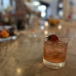 All Saints - Rhuby Sipper with blanco tequila, rose, clarified strawberry, rhubarb, vanilla, lemon, graham cracker, cinnamon.