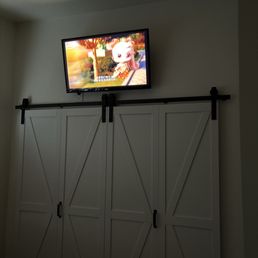 TV mounted above the closet. TV mounted above the closet.