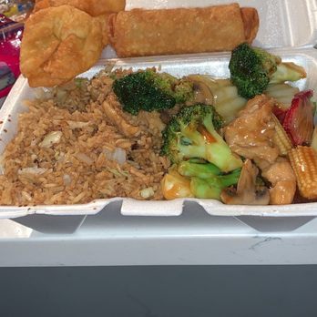 Peking Chinese Kitchen - Happy Family type special. Crab Rangoon sold separate. This box lunch and coke in back ground cost about only $8 - Chinese Near Me - Chicago, Illinois Peking Chinese Kitchen - Happy Family type special. Crab Rangoon sold separate. This box lunch and coke in back ground cost about only $8 - Chinese Near Me - Chicago, Illinois