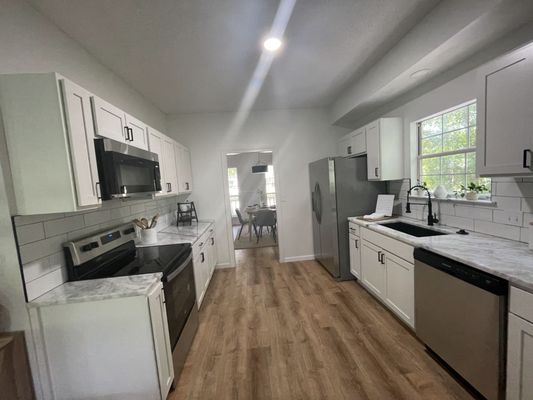 Turn 2 Remodeling & Roofing Logo