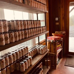 Old Hill Hard Cider - Wall of canned ciders you can purchase and take home with you. The also fill growlers and had bottles to purchase as well.