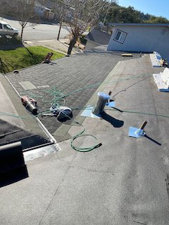 Slide of Adams Roofing