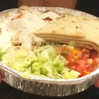 The Halal Guys - Small chicken platter with extra extra white sauce and a few drops of hot sauce. Perfect portion size. - Middle Eastern Near Me - Chicago, Illinois