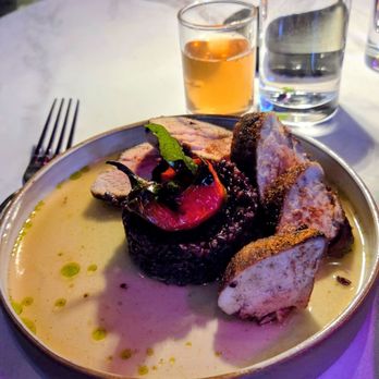 Black Iron Bystro - Pork tenderloin with black rice - Cocktail Bars Near Me - Kenmore, New York