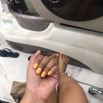 Bella Nails & Brows - Got this really nice yellow/mango like color! I believe it was color 023 on their booklet. - Nail Salons Near Me - La Mesa, California