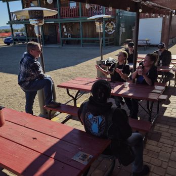 Dillon's at Western Trails Ranch - Back patio watching the team roping competition - Barbeque Near Me - Morristown, Arizona