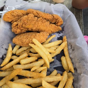 Skoog's Pub & Grill - Kids chicken tenders. Some of the fries had already been eaten by time picture was taken. Also came with a small dish of apple sauce - American Near Me - Utica, Illinois Skoog's Pub & Grill - Kids chicken tenders. Some of the fries had already been eaten by time picture was taken. Also came with a small dish of apple sauce - American Near Me - Utica, Illinois