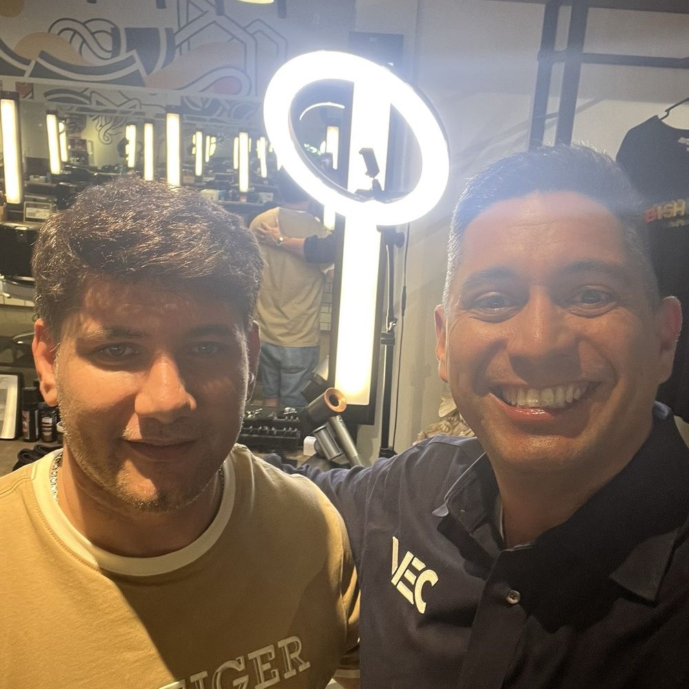 Dennis my barber and me With my new haircut