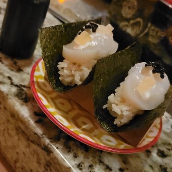 Omai Restaurant - Scallop hand rolls with a tiny squirt bottle of soy sauce - Japanese Near Me - Toronto, Ontario