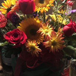 Pure Happiness bouquet (standard). Came in a nice vase and was IN A BOX which was super helpful for transport. Pure Happiness bouquet (standard). Came in a nice vase and was IN A BOX which was super helpful for transport.