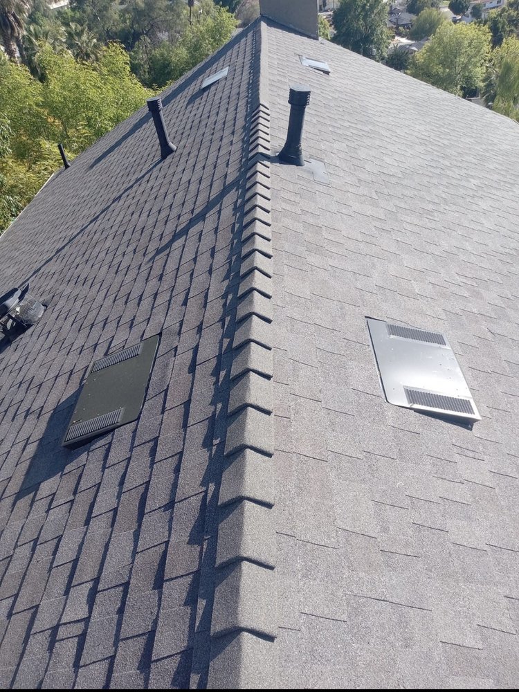 Slide of Precision Roofing