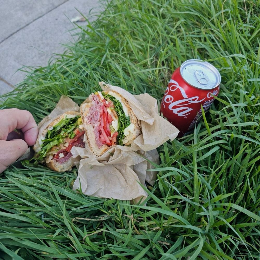 Lucinda's Deli & More - My son on the grass eating his sandwich (pastrami) - Delis Near Me - San Francisco, California Lucinda's Deli & More - My son on the grass eating his sandwich (pastrami) - Delis Near Me - San Francisco, California
