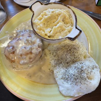 Honeycomb Cafe - Biscuit and gravy with eggs and grits - New American Near Me - Belmont, North Carolina