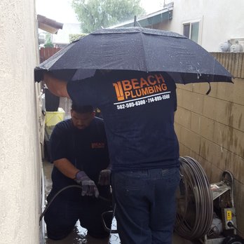 Beach Plumbing - Richard, Fabian and Rene working in the rain and hail. - Plumbing Near Me - Long Beach, California