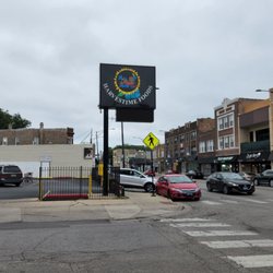HarvesTime Foods - Sign at parking lot.