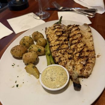 Seasons 52 - Wood-Grilled Idaho Rainbow Trout - New American Near Me - Orlando, Florida Seasons 52 - Wood-Grilled Idaho Rainbow Trout - New American Near Me - Orlando, Florida