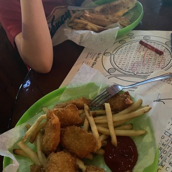 Ocean Deck - Kids meals in  take-home frisbees --fried shrimp & grilled cheese (both with fries) - Seafood Near Me - Daytona Beach, Florida