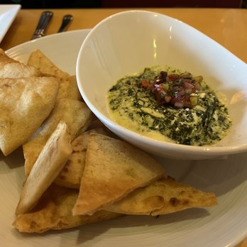Mythos Restaurant - Spanakopita dip with freshly-made pita chips. Excellent appetizer. Highly recommended. - New American Near Me - Orlando, Florida Mythos Restaurant - Spanakopita dip with freshly-made pita chips. Excellent appetizer. Highly recommended. - New American Near Me - Orlando, Florida
