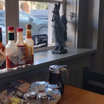 Downtown cafe - Of you out the window it's nice how they arrange the condiments - Breakfast & Brunch Near Me - Pittsburg, California