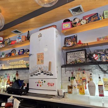 Mom's Kitchen & Bar - Looks like it was taken out of an I spy book. Can you find Batman? Lol - Bars Near Me - Astoria, New York Mom's Kitchen & Bar - Looks like it was taken out of an I spy book. Can you find Batman? Lol - Bars Near Me - Astoria, New York