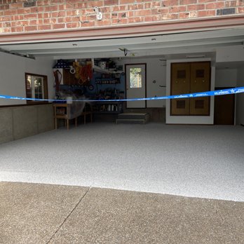 Iconic Floor Coatings - a car parked in a garage - Flooring Near Me - Albany, Oregon