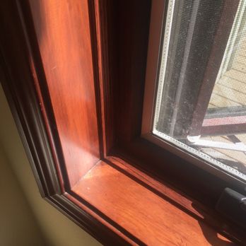 Grand Seattle Paint - Restained window - Painters Near Me Grand Seattle Paint - Restained window - Painters Near Me