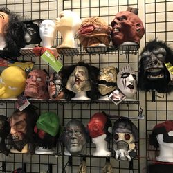 RIP Halloween Costumes - Masks on masks on masks.