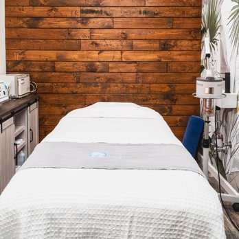 ZZ Day Spa - A small massage room with a single massage table - Day Spas Near Me - New York, New York ZZ Day Spa - A small massage room with a single massage table - Day Spas Near Me - New York, New York