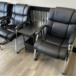 Pro-Care Auto - Comfortable seating and cell phone charging stations with internet access.