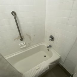 Who paints shower tiles?