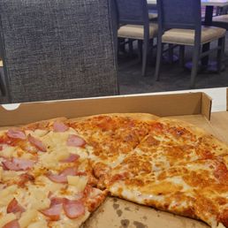 Hawaiin on left side and 5 cheese on right Hawaiin on left side and 5 cheese on right