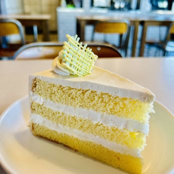 Hey Bangkok! - Fresh coconut cake with fresh coconut bits in the filling - delicious! - Thai Near Me - Denver, Colorado